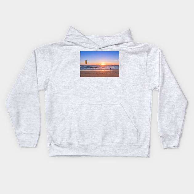 Kite surfer watching the waves Kids Hoodie by homydesign